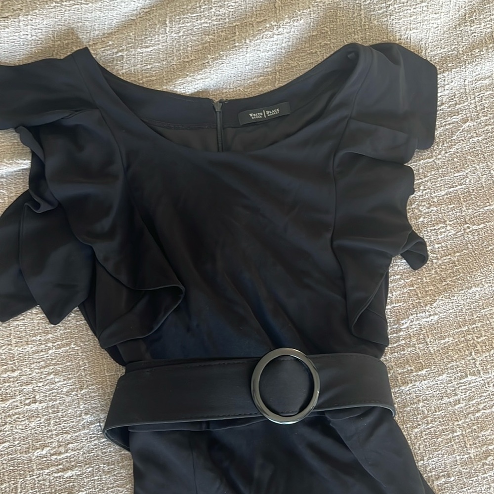 White House| Black Market belted black dress.